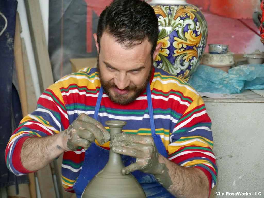 Image link of a Sicilian potter throwing a vase.