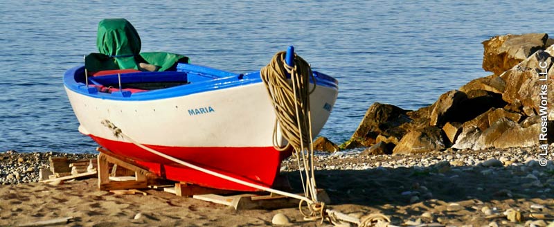A a beached fishing boat southwestern Sicily. The sea always beckons.
